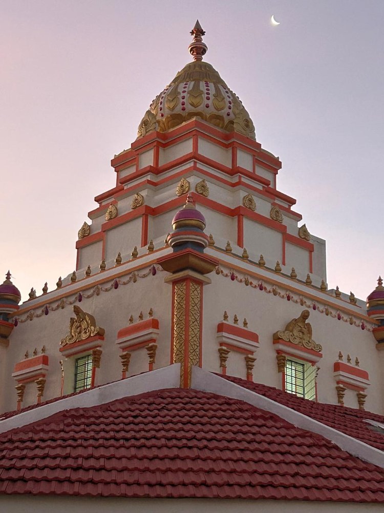 The temple gopuram at twilight